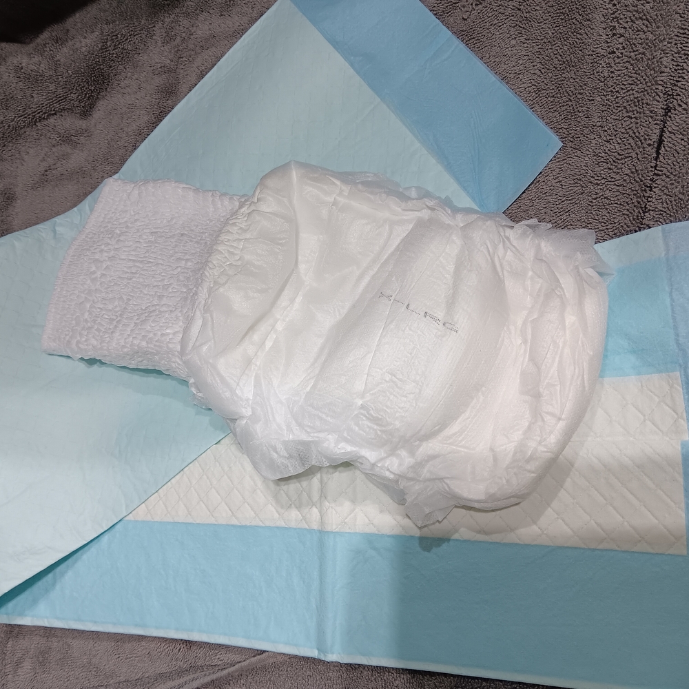 5-White Disposable  Lady XL. Underware  With 5- Disposable plastic bed Pads